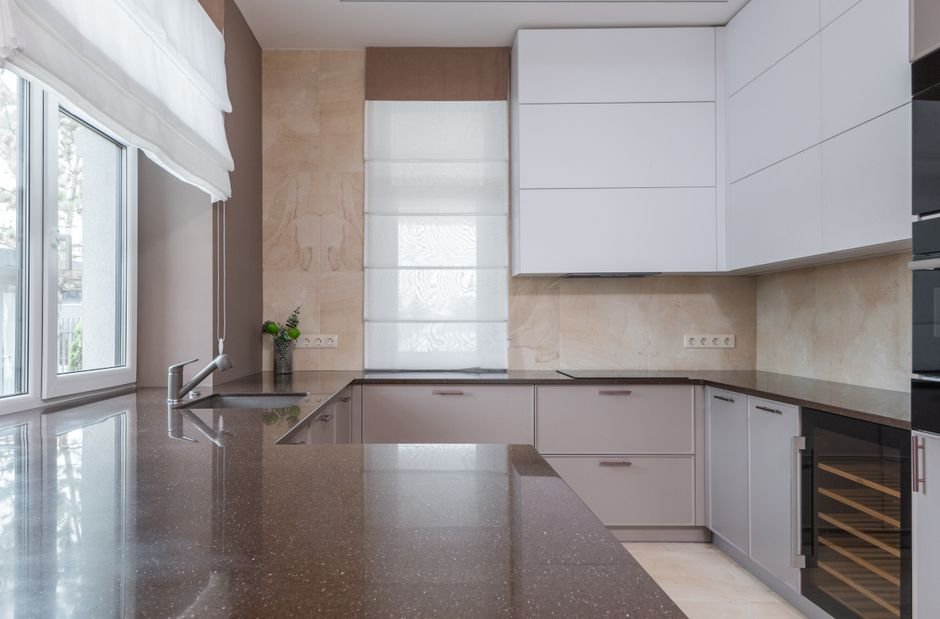 A modern kitchen featuring a countertop suitable for an automatic pill dispenser, relevant to pill dispenser reviews.